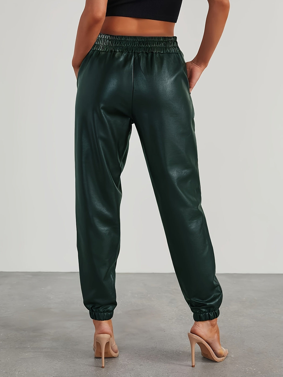 Pantalon aspect cuir à taille et chevilles élastiquées — Amielle Paris