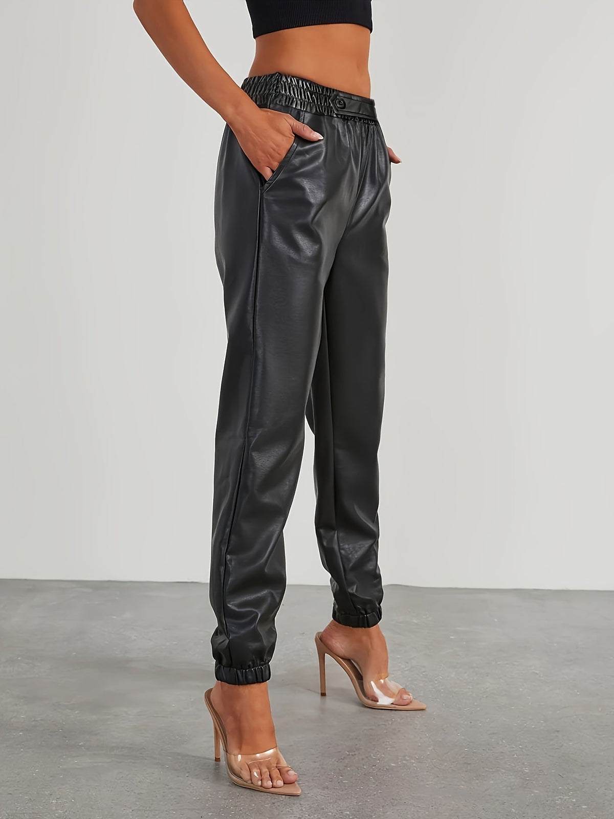 Pantalon aspect cuir à taille et chevilles élastiquées — Amielle Paris