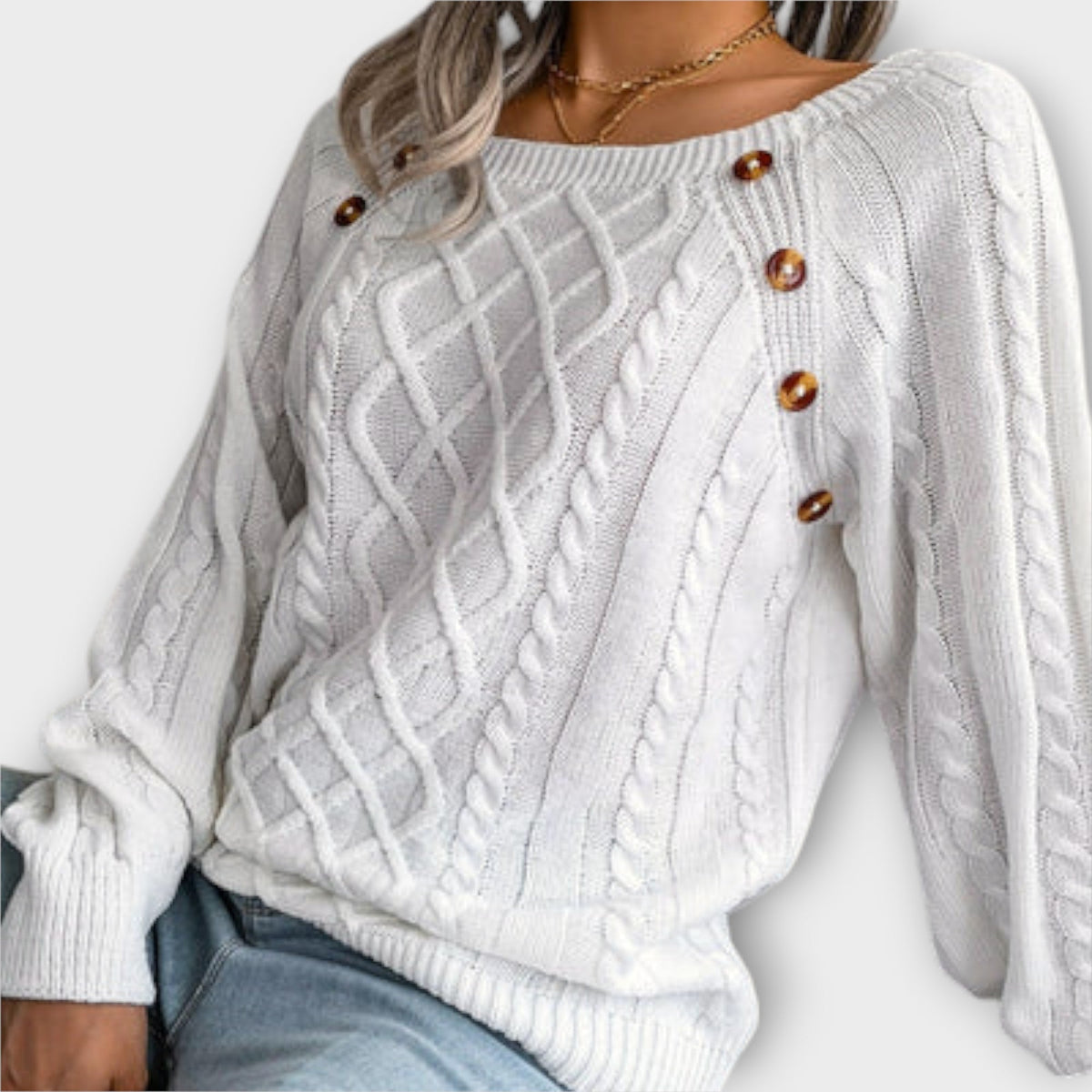 Malia | Pull à boutons et torsades