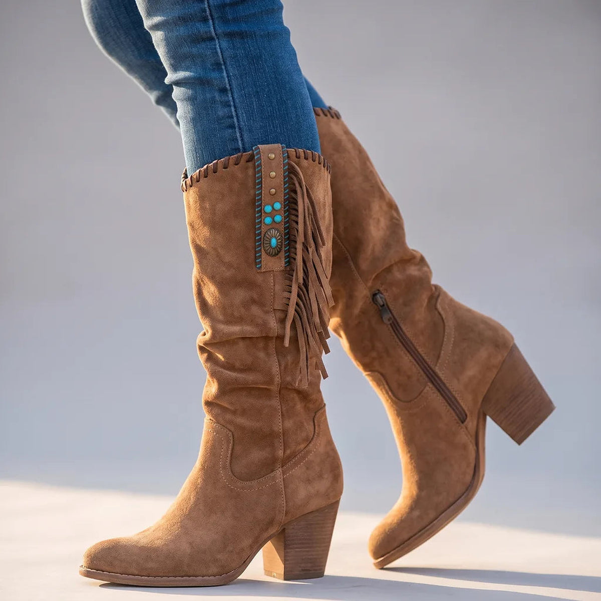 Bottes hautes à franges effet daim