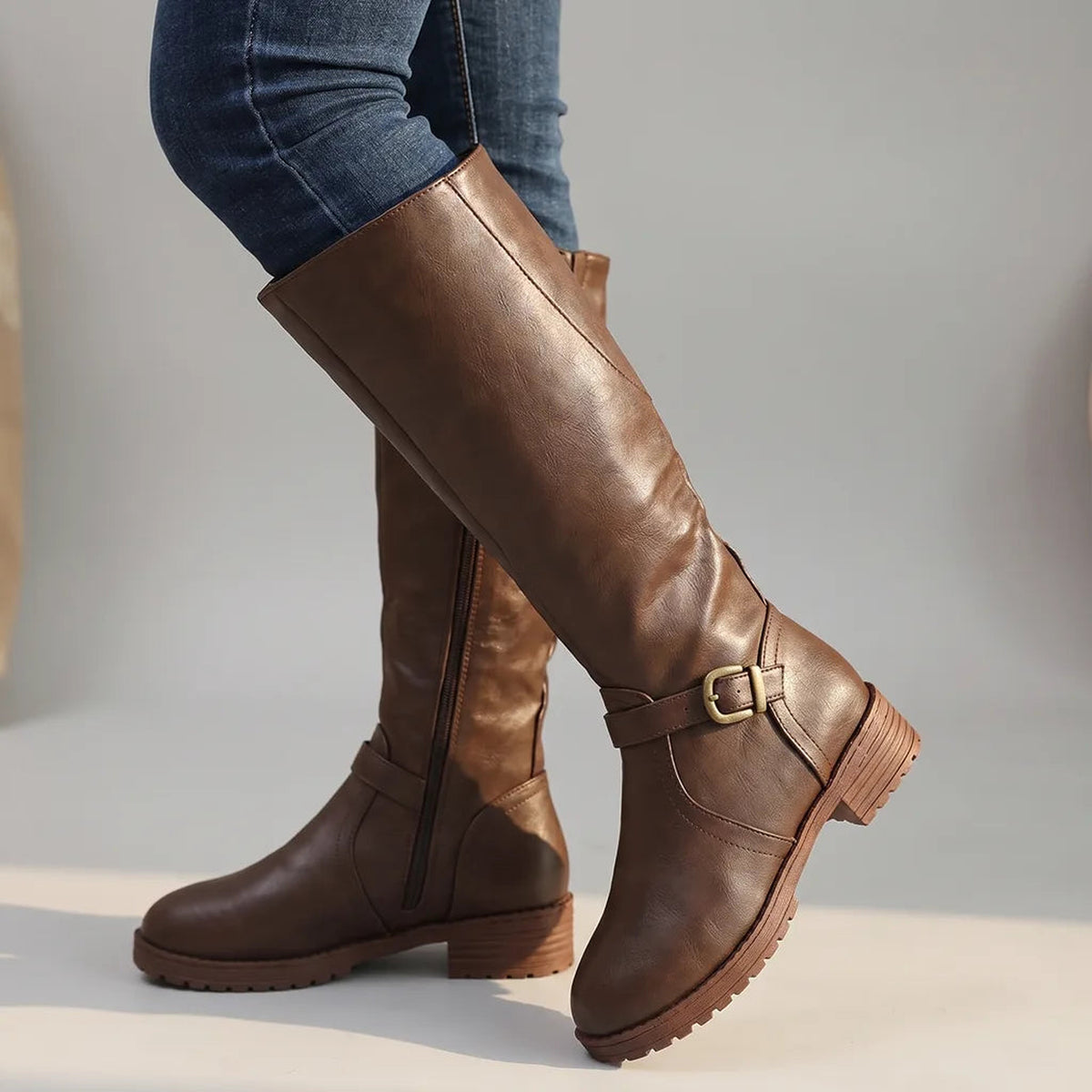Bottes hautes à boucle et semelle crantée