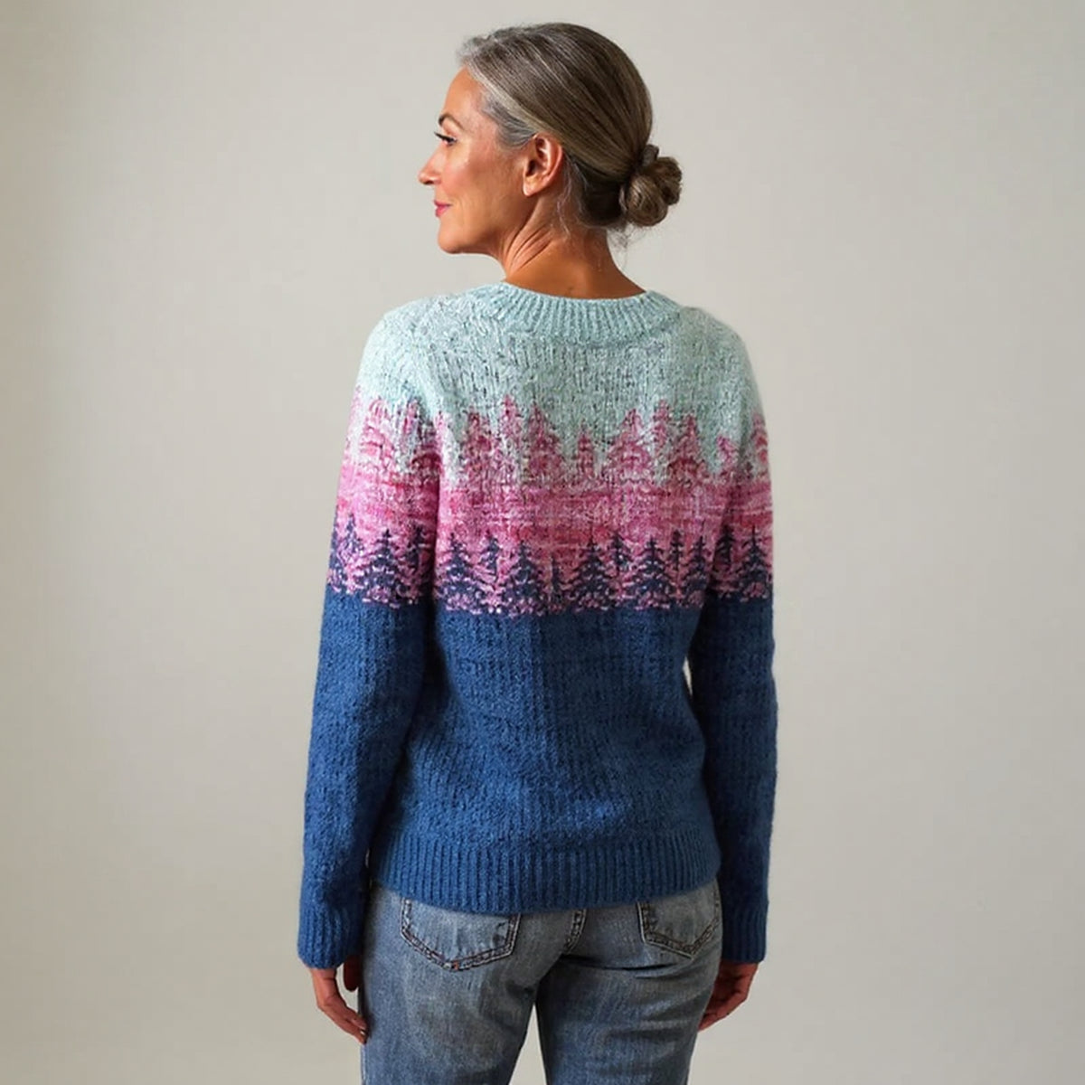 Pull bleu et rose à motifs nordiques