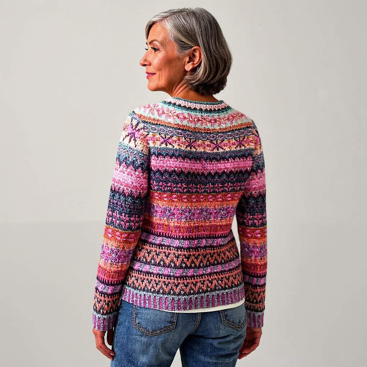 Pull rose et violet à motifs nordiques