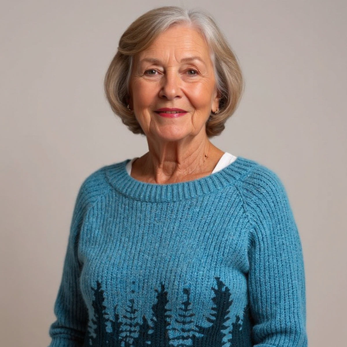 Pull bleu à motif forêt