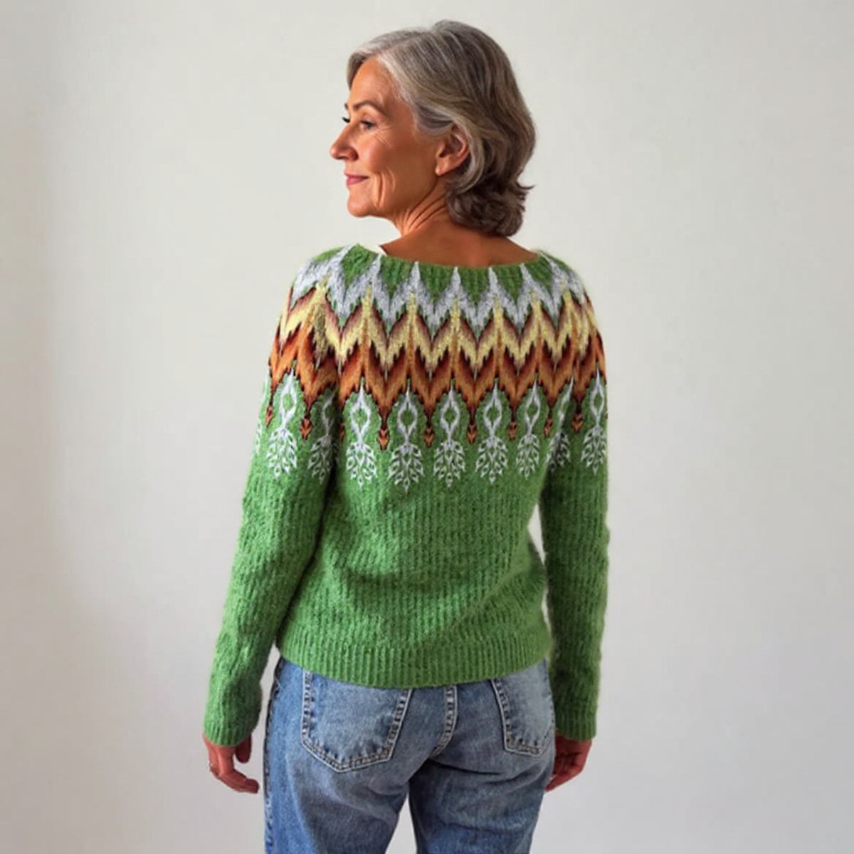Pull vert à motifs losanges