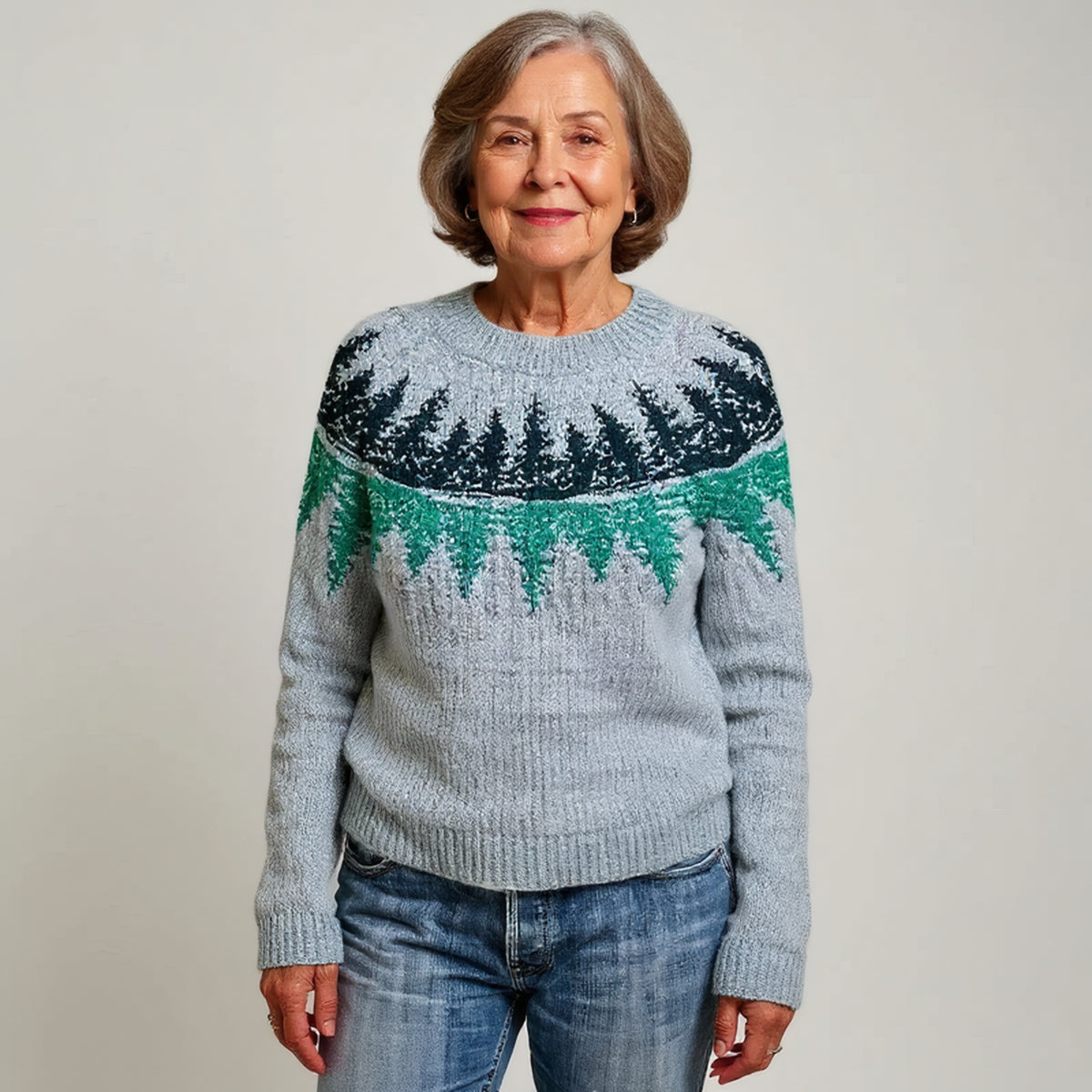 Pull gris à motif sapins verts