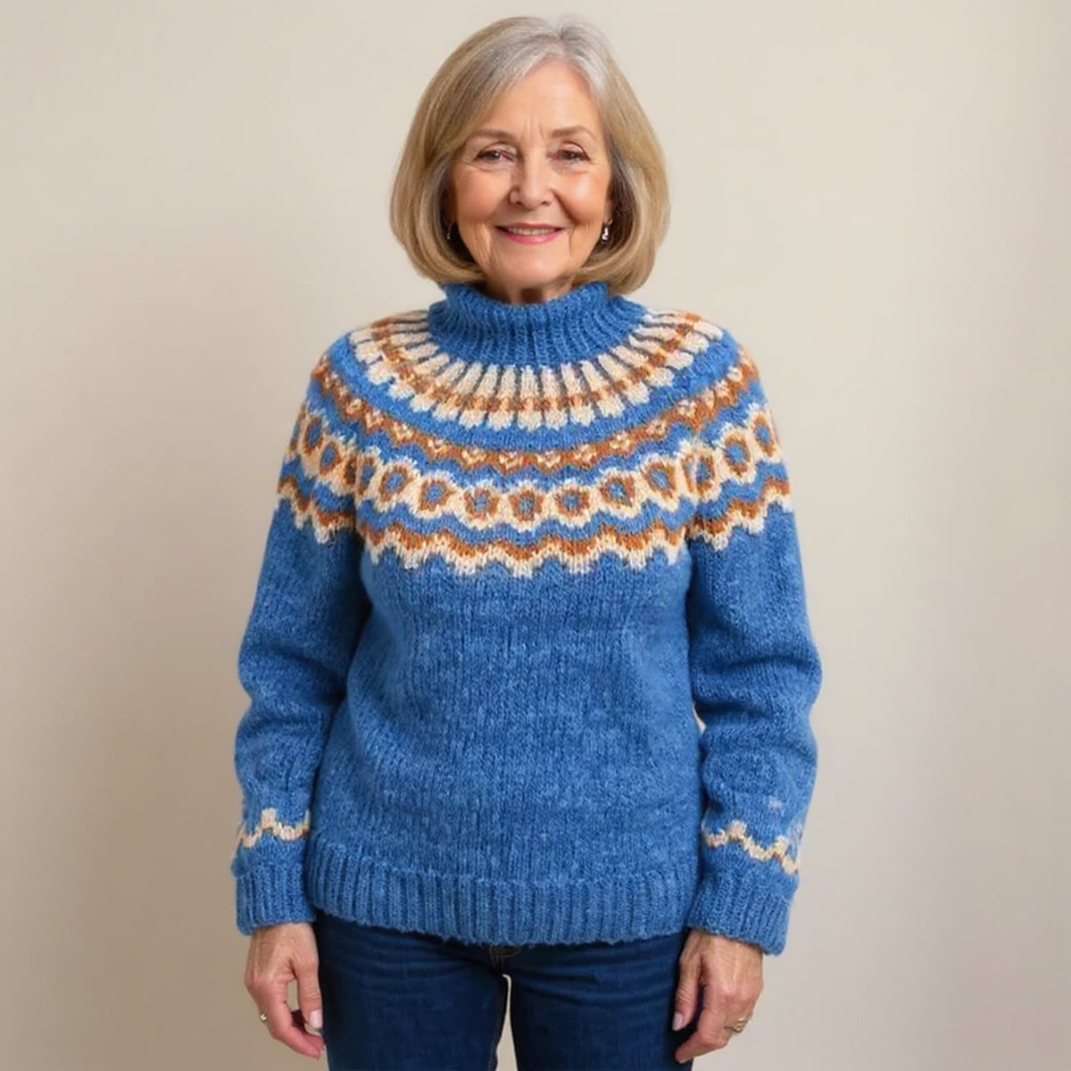 Pull orange à col montant et motifs nordiques
