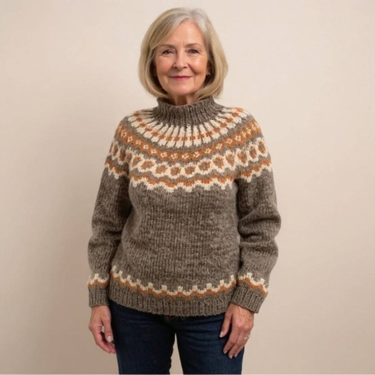 Pull orange à col montant et motifs nordiques