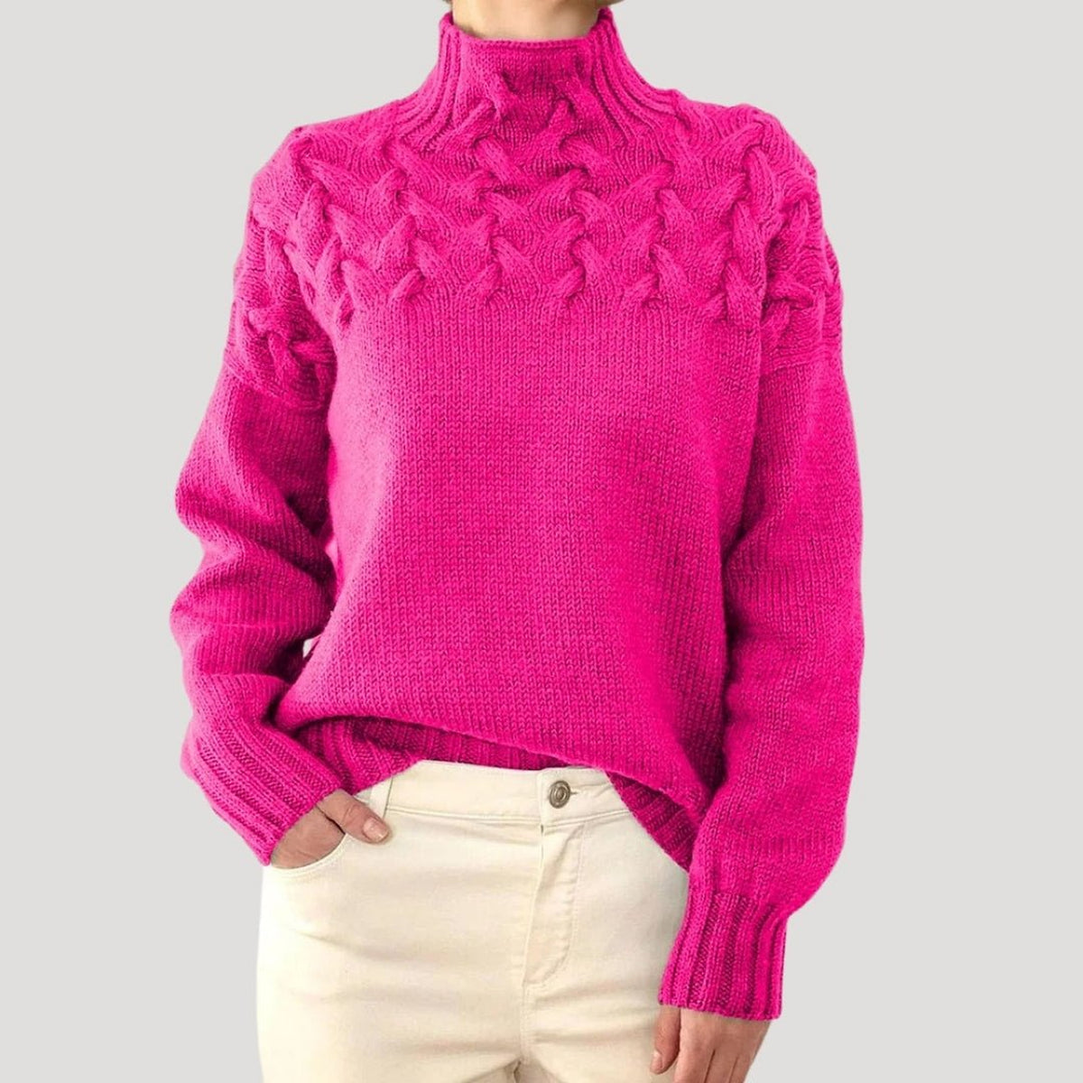Pull en maille torsadée à col montant