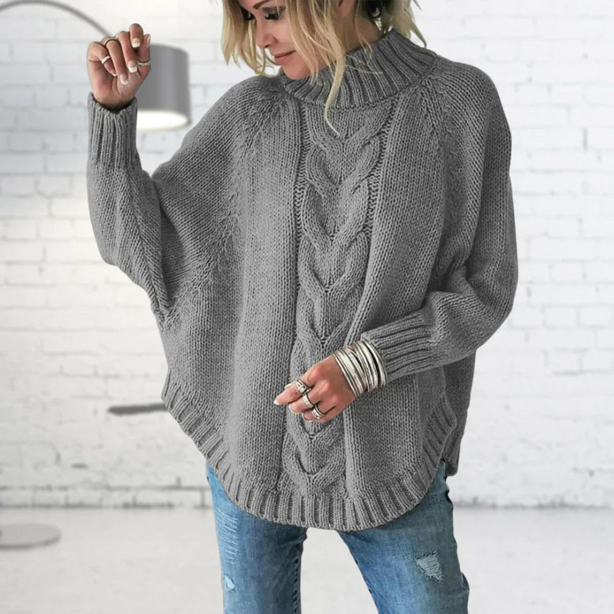 Pull oversize torsadé à col roulé
