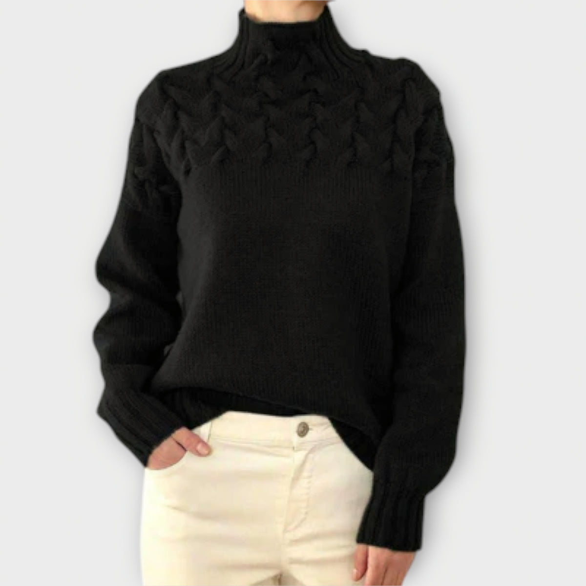Eva | Pull noir à détails torsadés