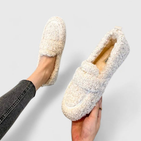Chaussons effet peau lainée à semelle antidérapante
