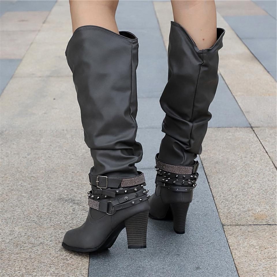 Bottes hautes souples à brides cloutées — Amielle Paris