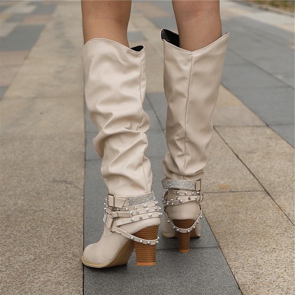 Bottes hautes souples à brides cloutées — Amielle Paris