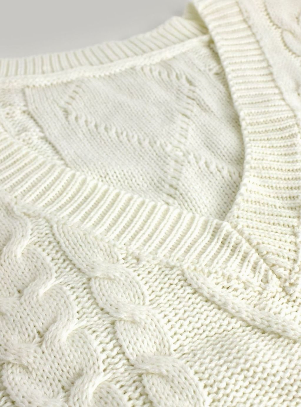Pull ample sans manches torsadé à col V — Amielle Paris