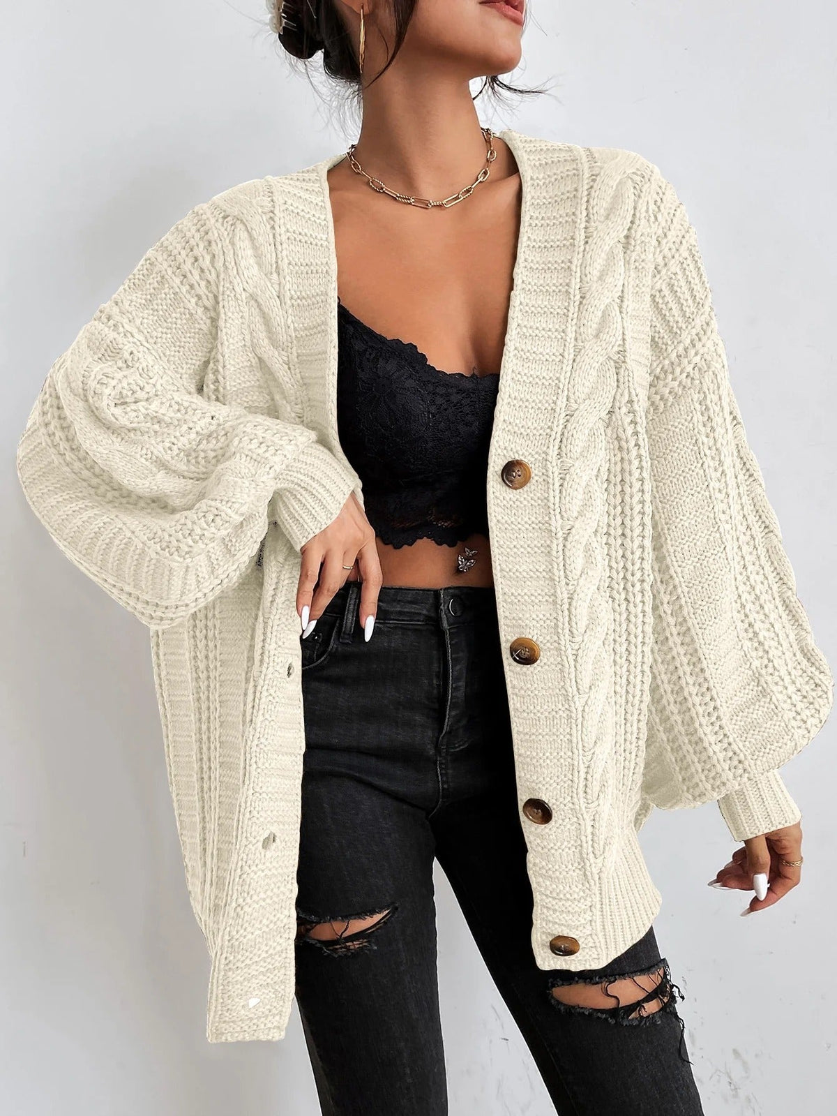 Gilet ample torsadé à col V — Amielle Paris