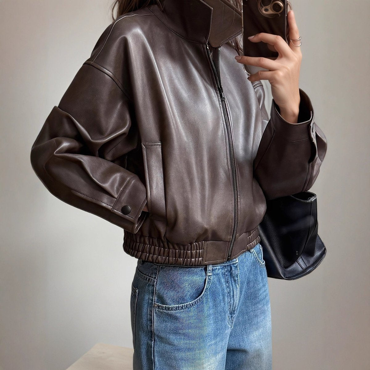 Blouson aspect cuir zippé à col montant — Amielle Paris
