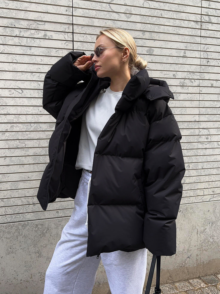 Doudoune ample à capuche et poches latérales — Amielle Paris