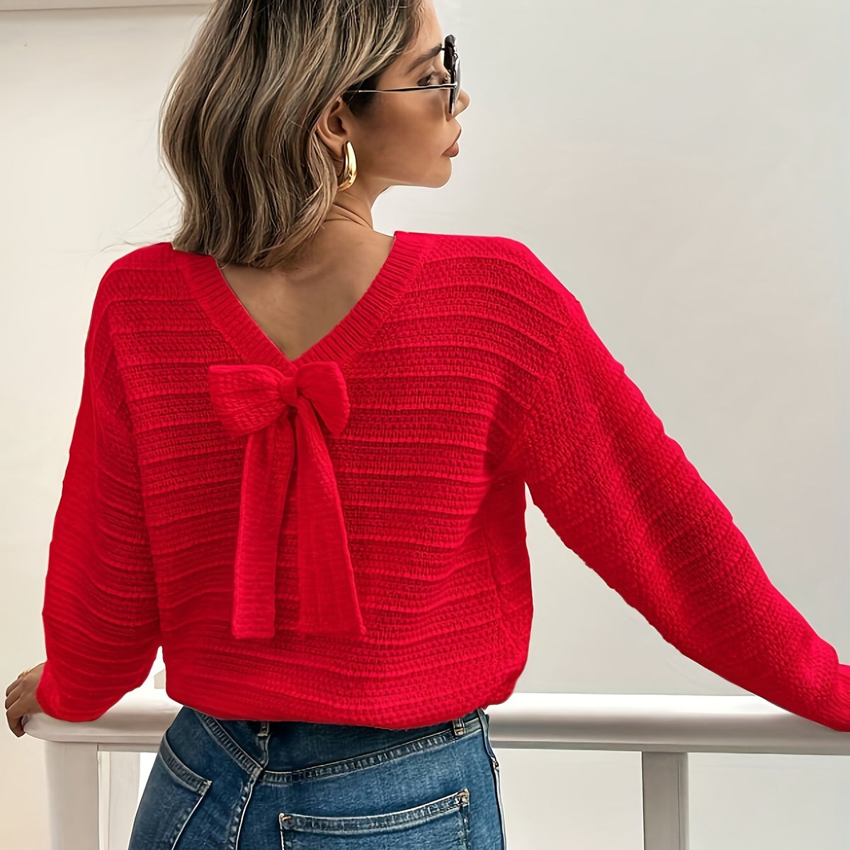 Pull en maille à col en V et nœud — Amielle Paris