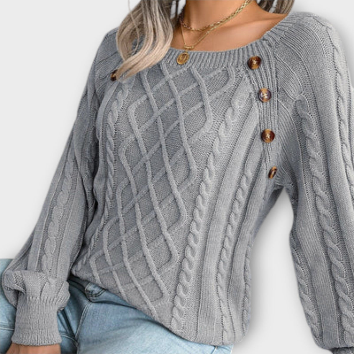 Malia | Pull à boutons et torsades