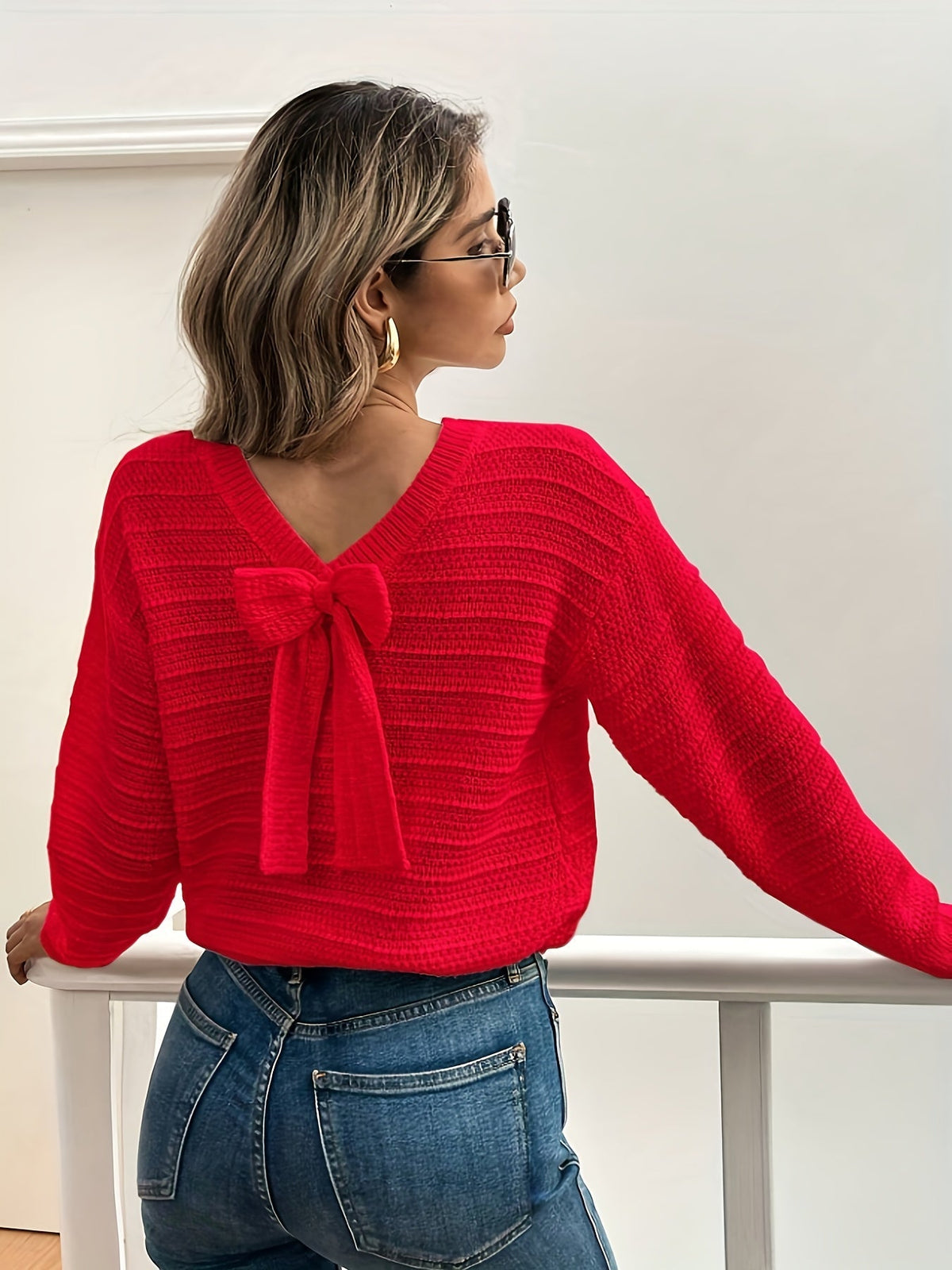 Pull en maille à col en V et nœud — Amielle Paris