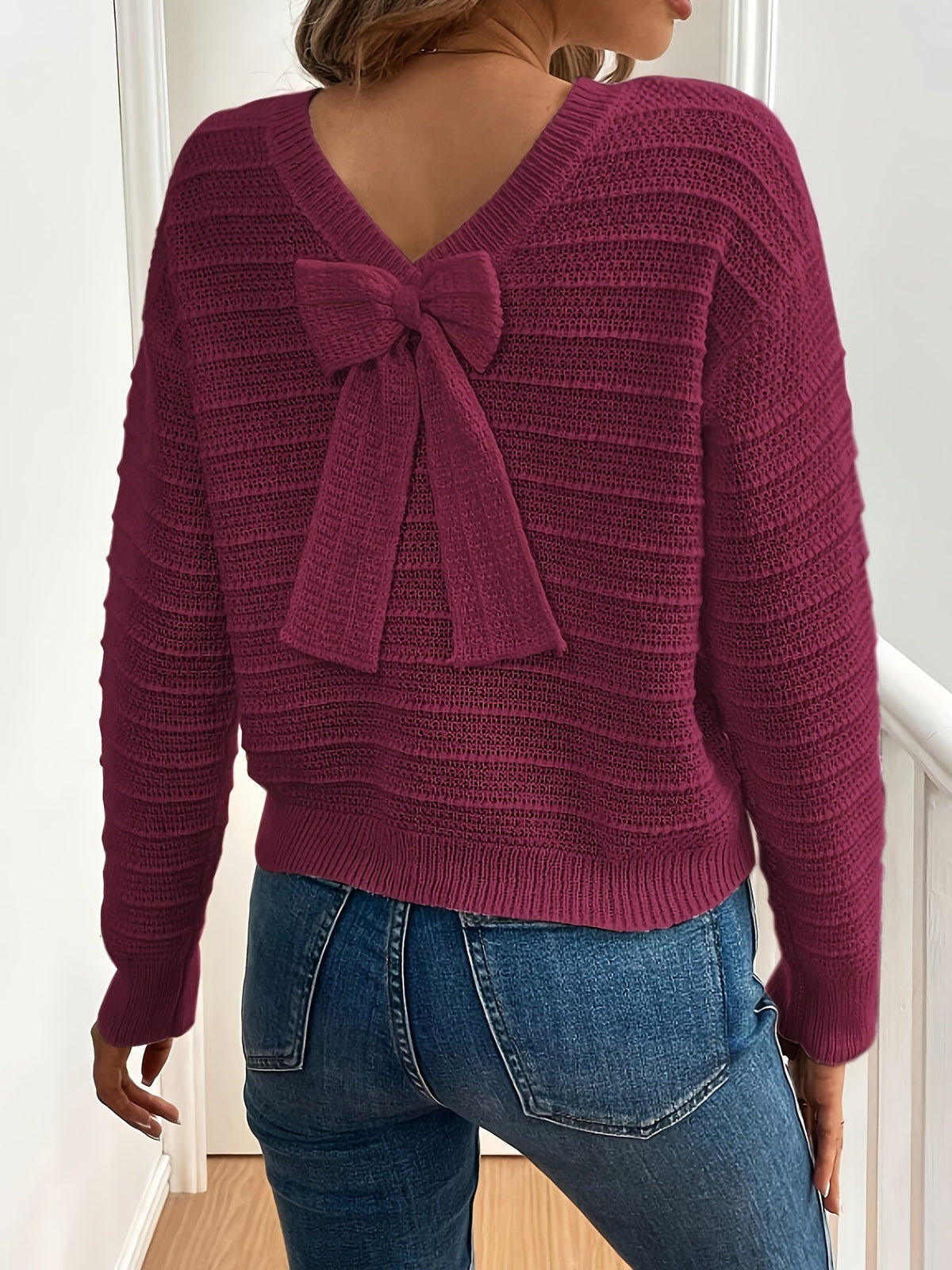 Pull en maille à col en V et nœud — Amielle Paris