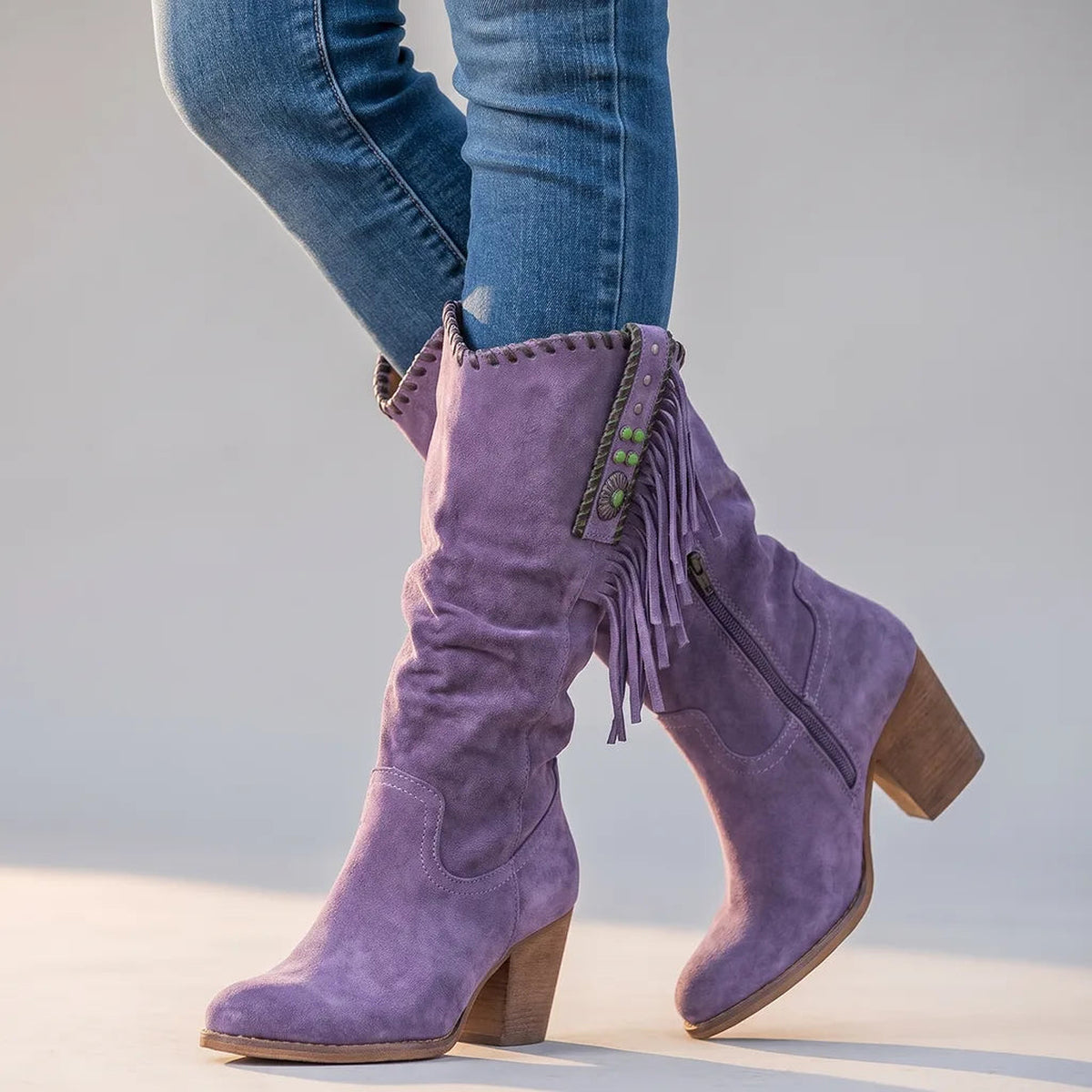 Bottes hautes à franges effet daim