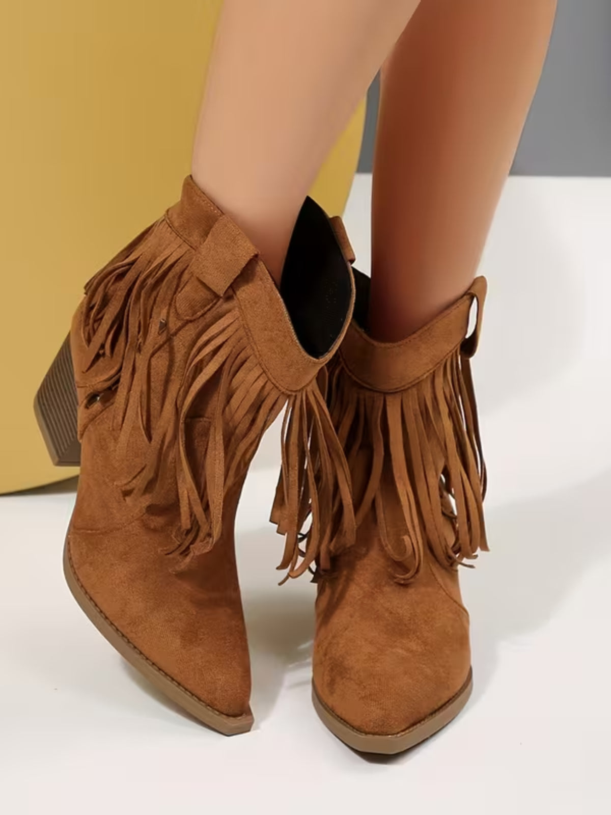 Bottines à franges et talon bloc