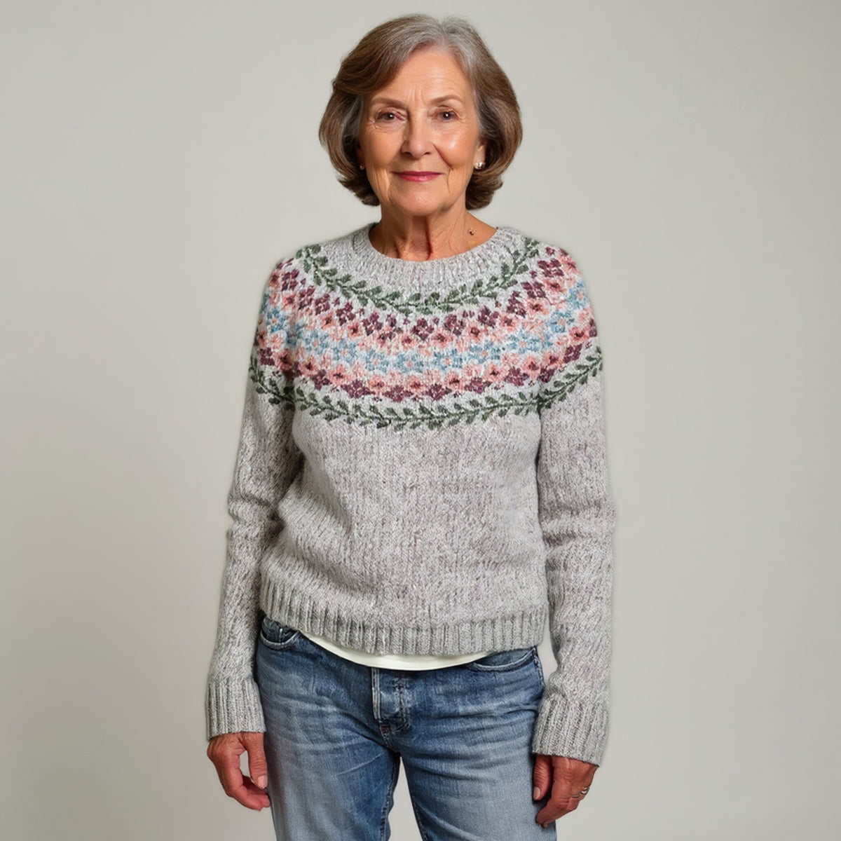 Pull gris à empiècement nordique rose