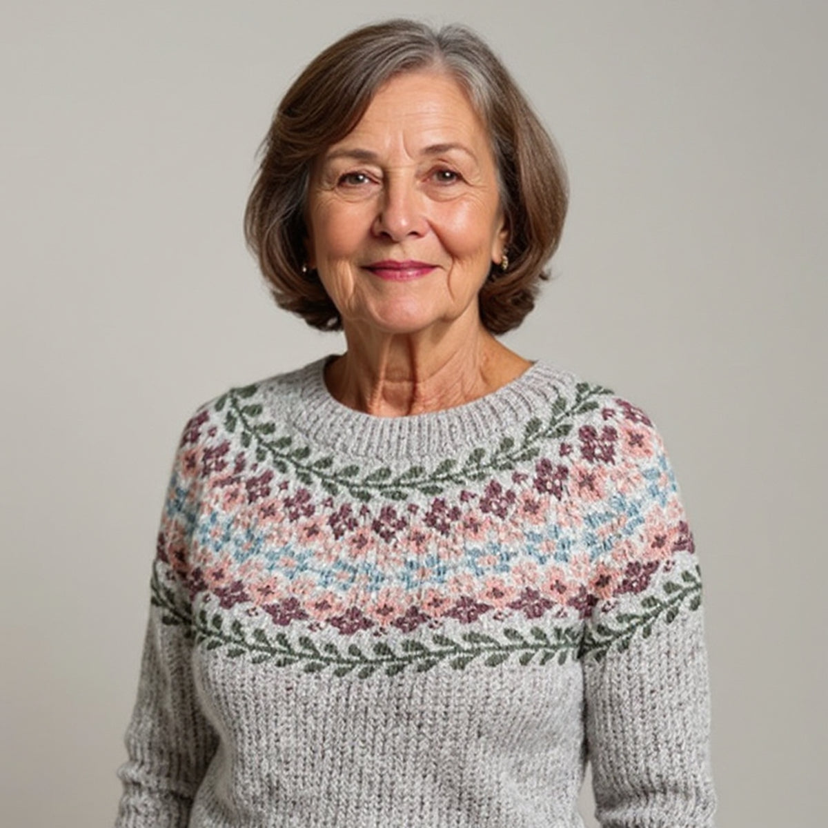 Pull gris à empiècement nordique rose