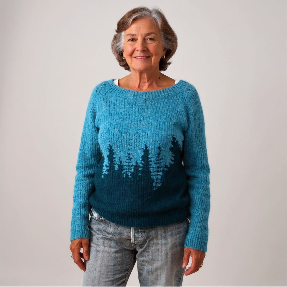 Pull bleu à motif forêt