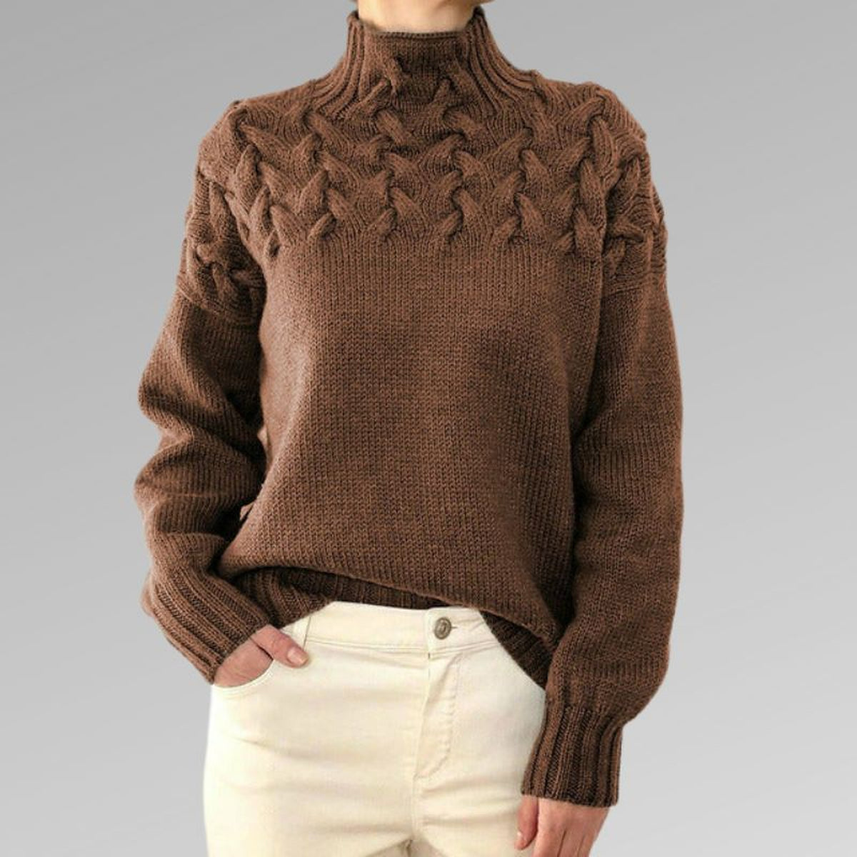 Pull à col montant et torsades