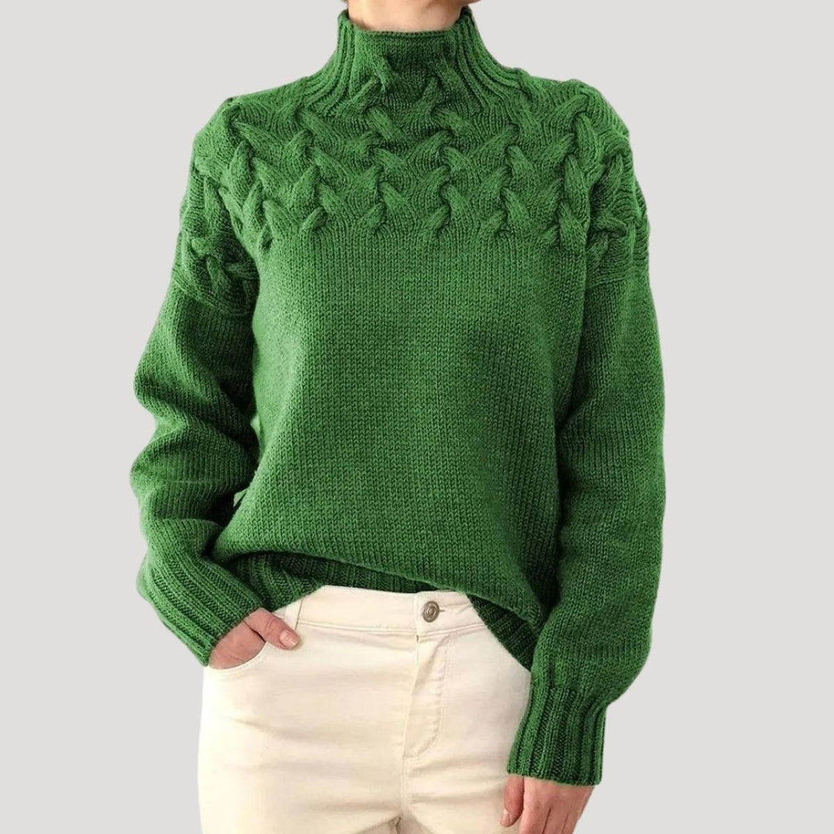 Pull en maille torsadée à col montant