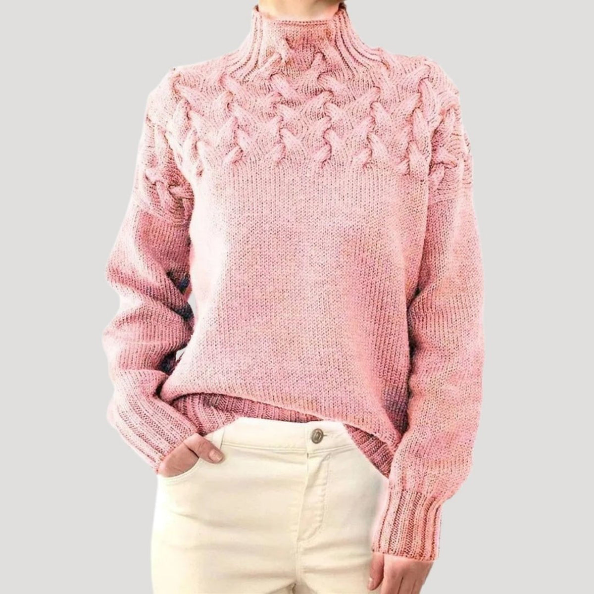Pull en maille torsadée à col montant