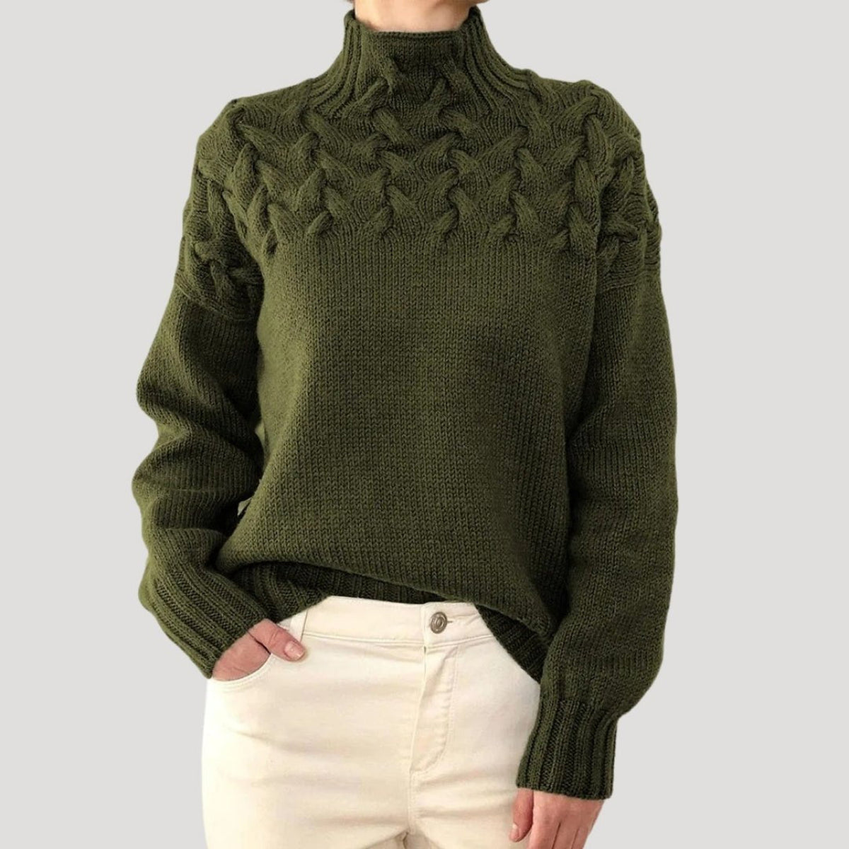 Pull en maille torsadée à col montant