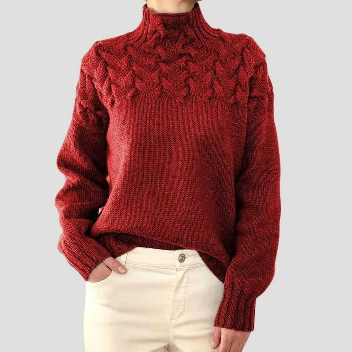 Pull en maille torsadée à col montant