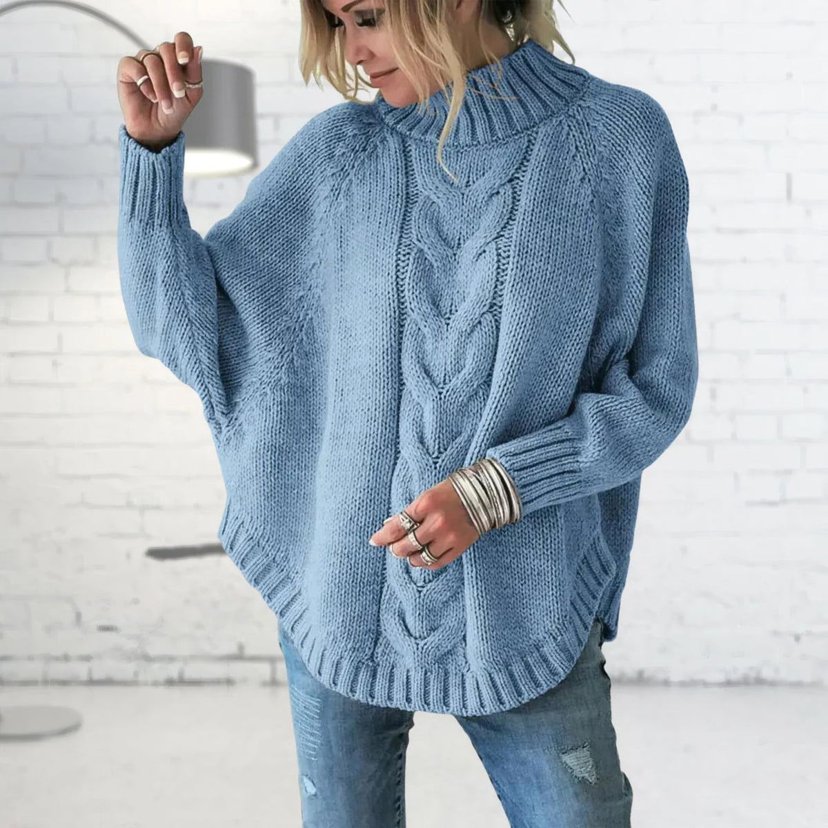 Pull oversize torsadé à col roulé