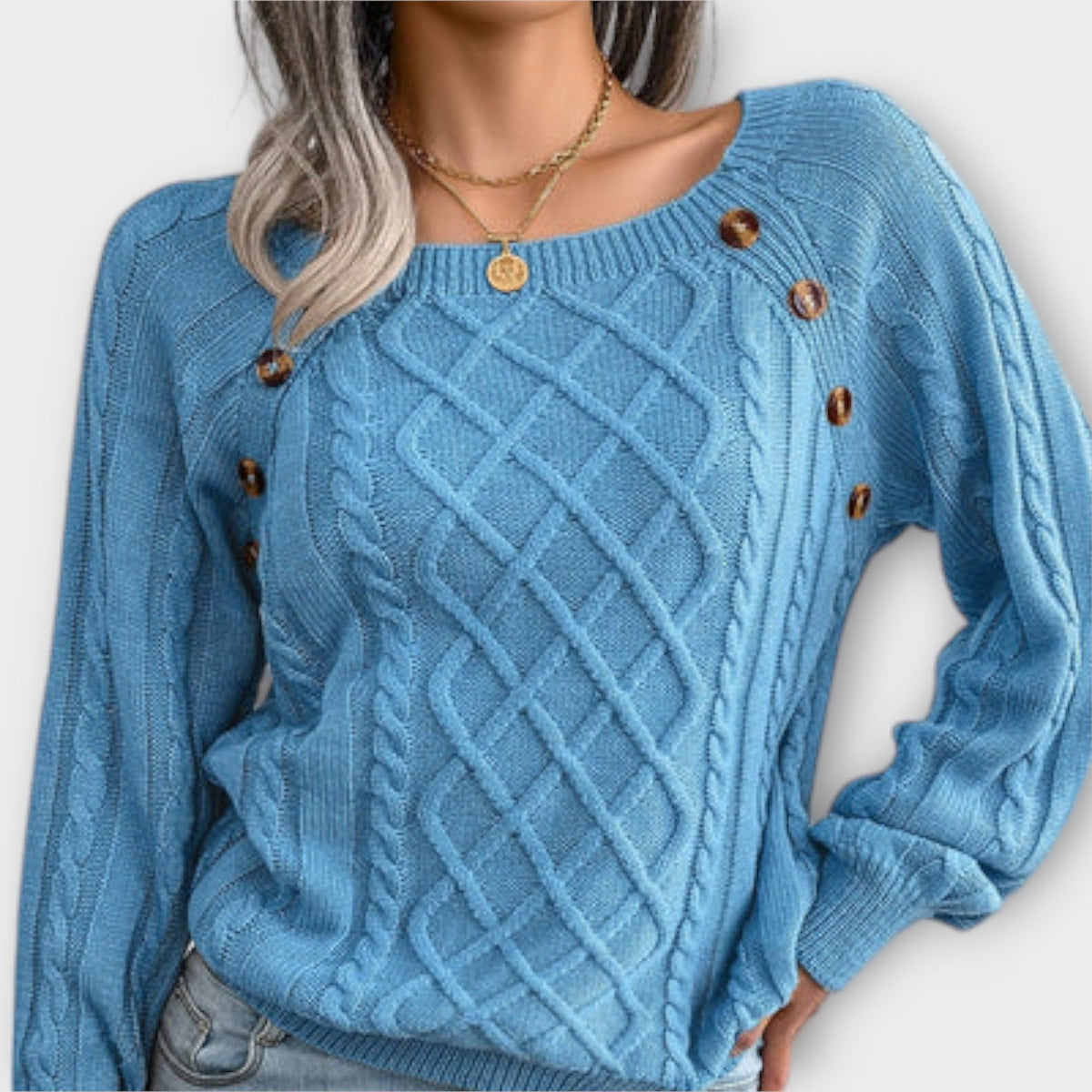 Malia | Pull à boutons et torsades