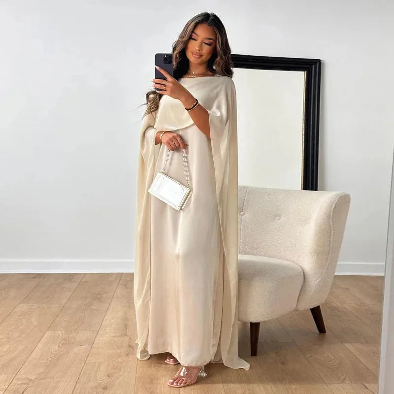 Robe longue effet cape à manches drapées — Amielle Paris