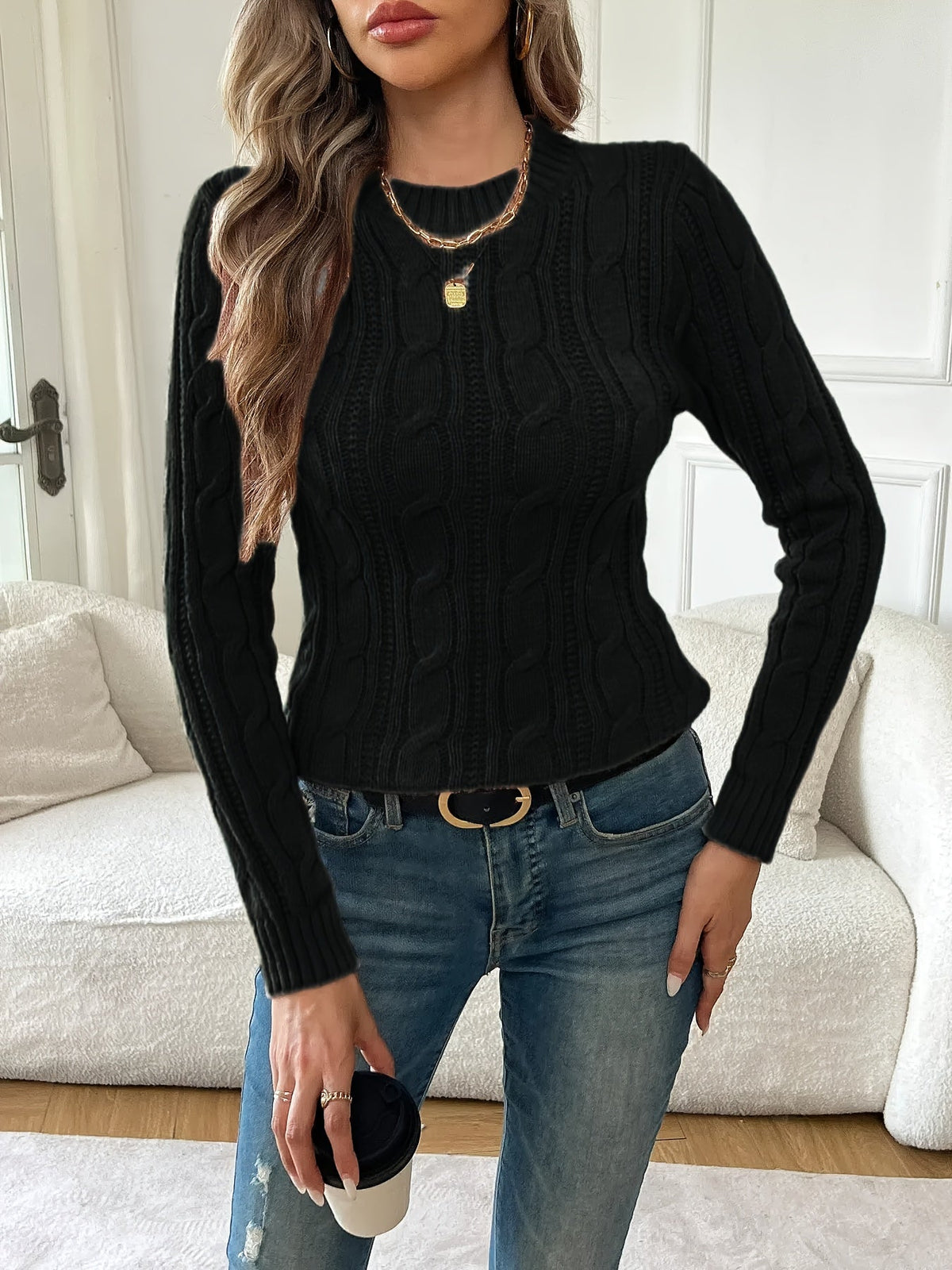 Pull noir torsadé à col rond — Amielle Paris