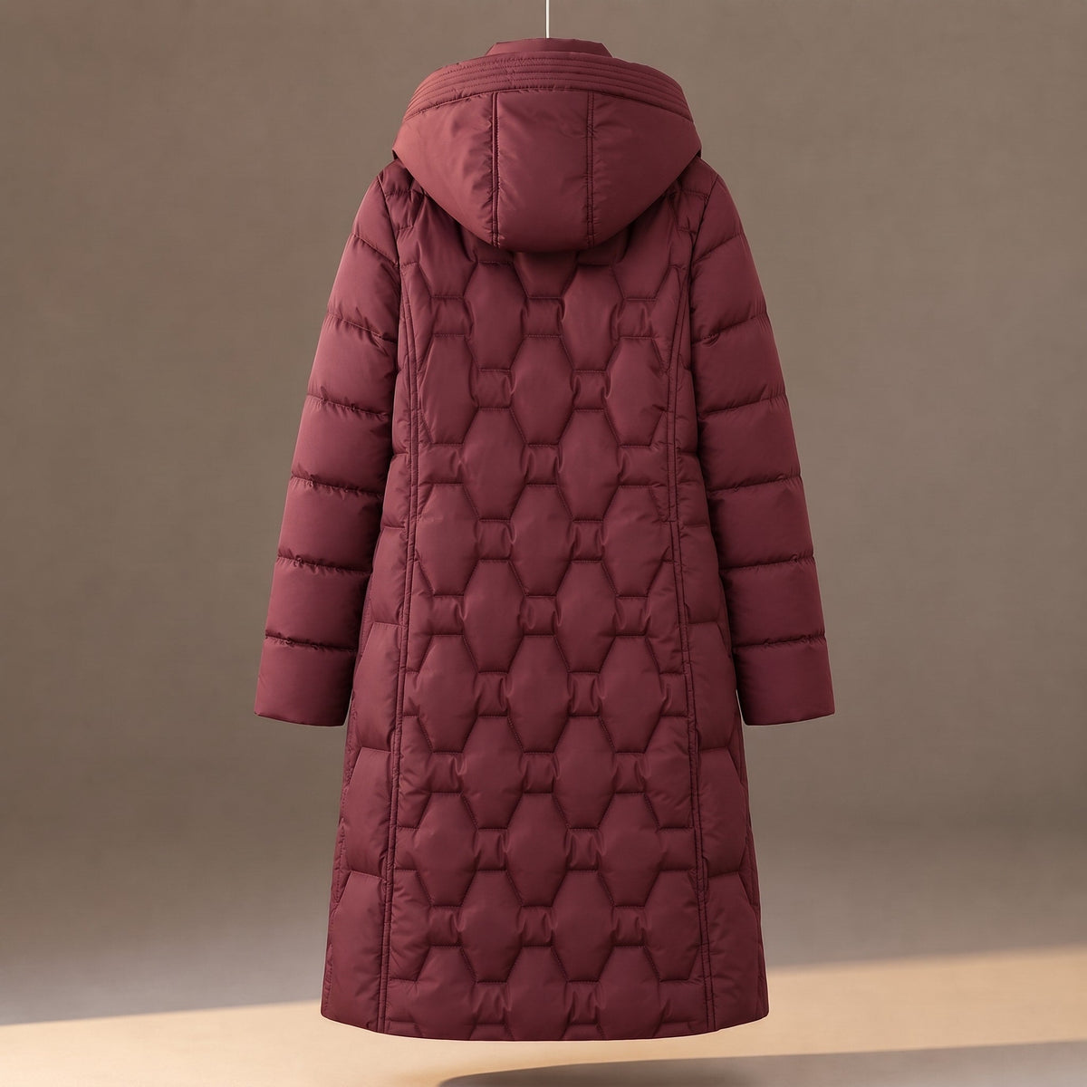 Doudoune très longue matelassée à capuche — Amielle Paris