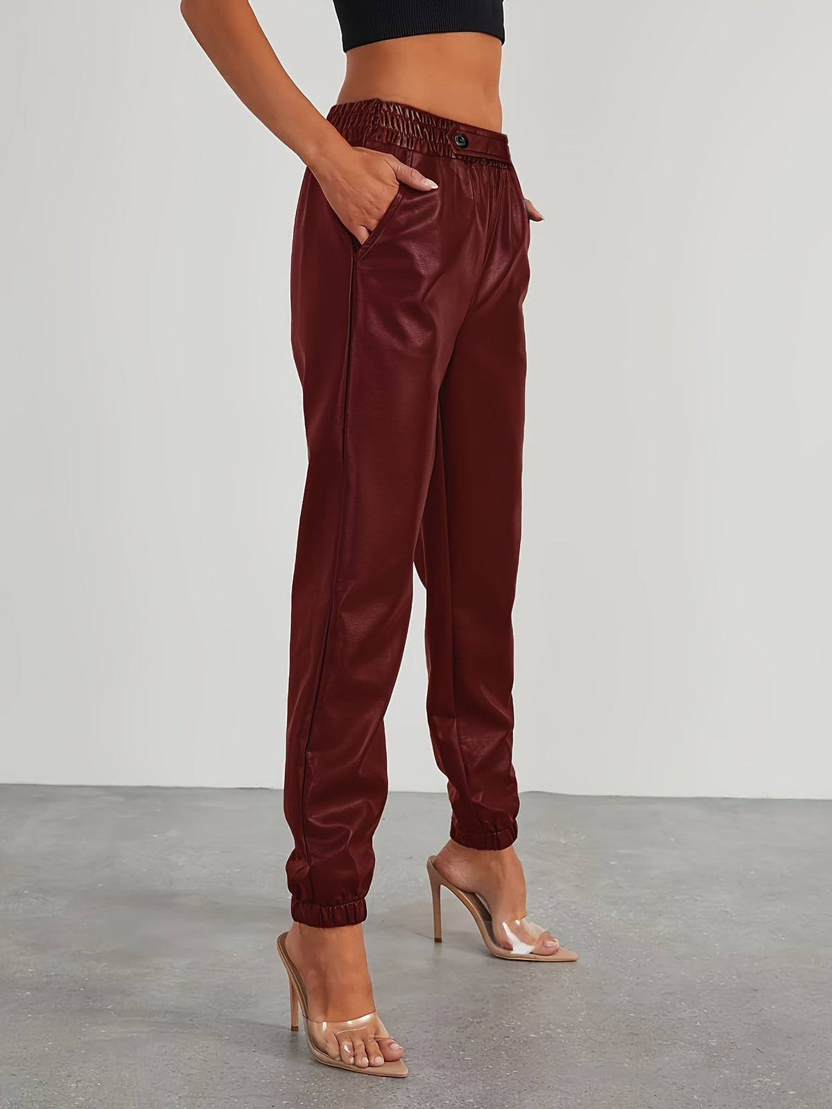 Pantalon aspect cuir à taille et chevilles élastiquées — Amielle Paris