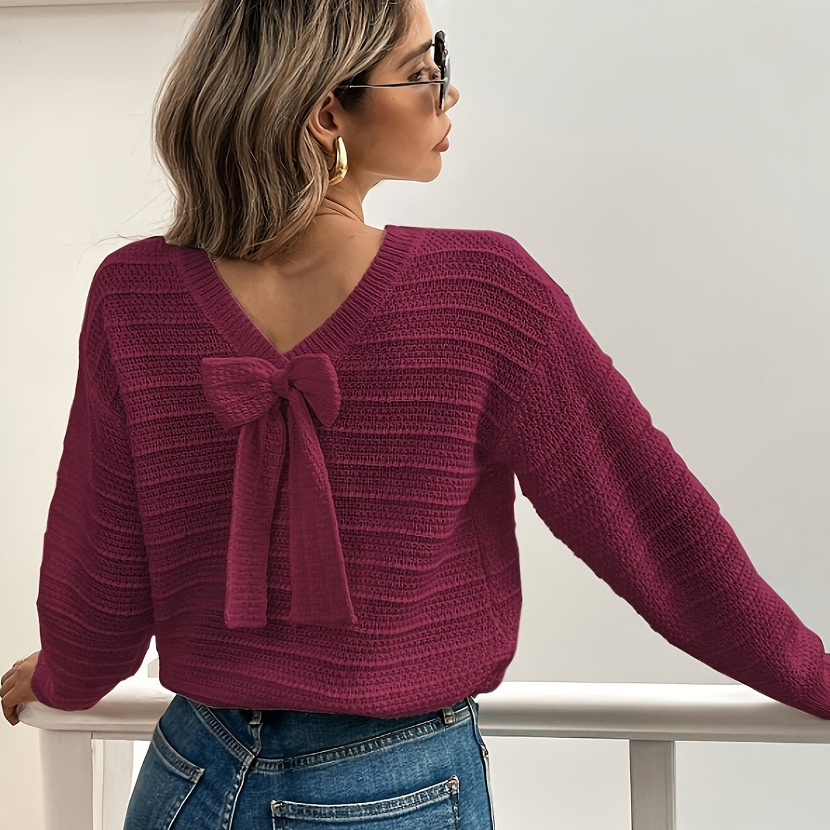 Pull en maille à col en V et nœud — Amielle Paris