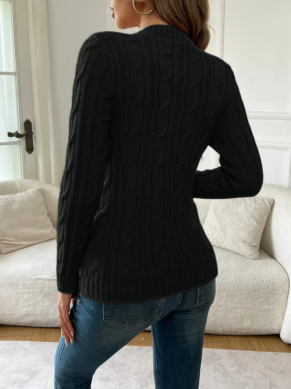 Pull noir torsadé à col rond — Amielle Paris