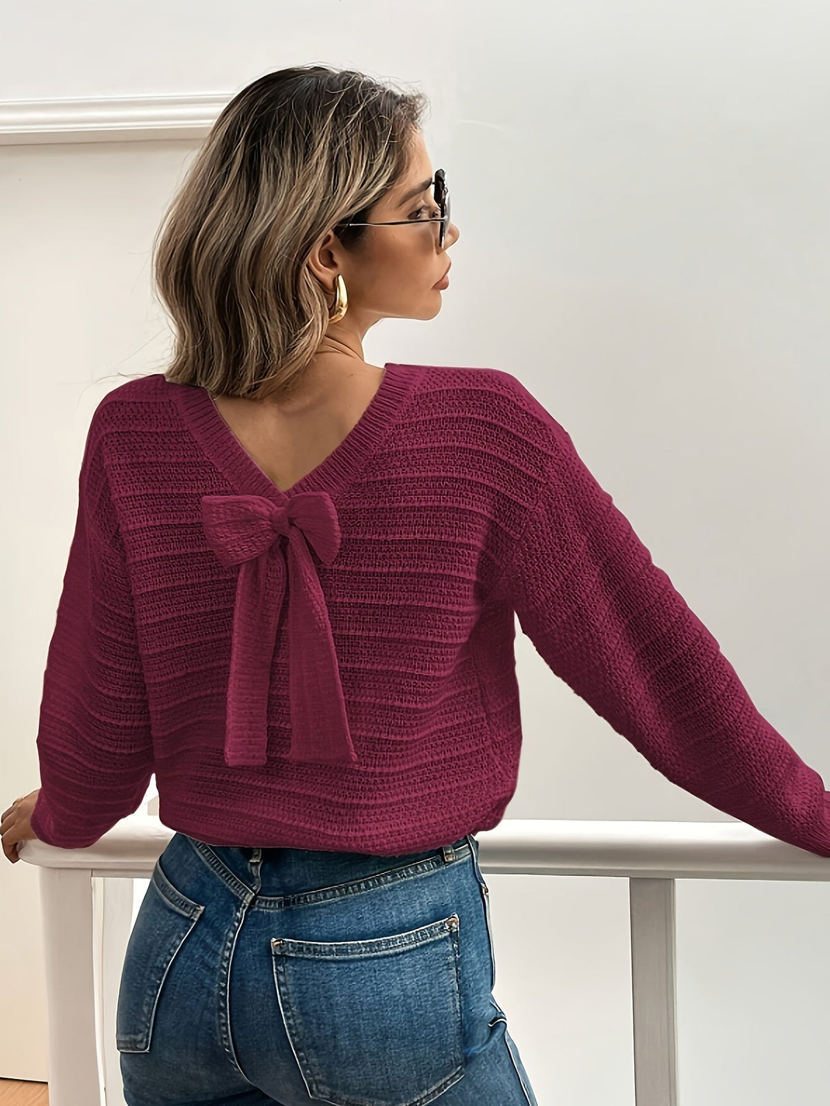 Pull en maille à col en V et nœud — Amielle Paris