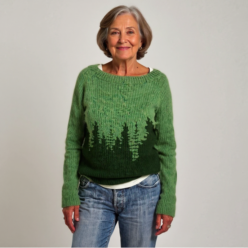 Pull vert à motif forêt