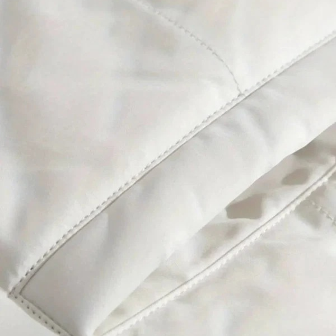 Lina — Veste matelassée à col haut — Amielle Paris