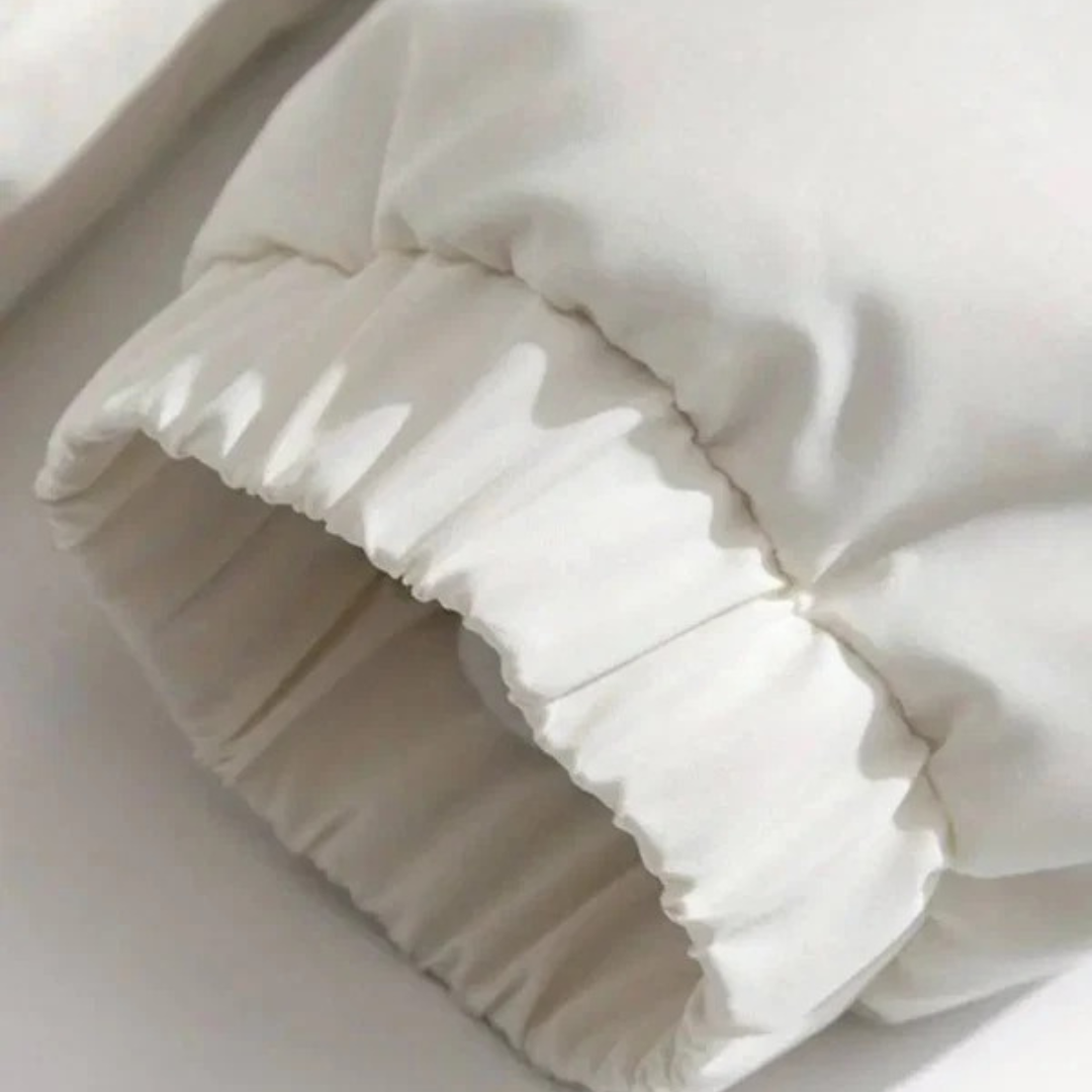 Lina — Veste matelassée à col haut — Amielle Paris